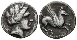 EMPORITON. Dracma. Sant Martí de Ampurias (Gerona). 220-150 a.C. A/ Cabeza femenina a derecha con tres delfines a su alrededor. R/ Pegaso a derecha, d...