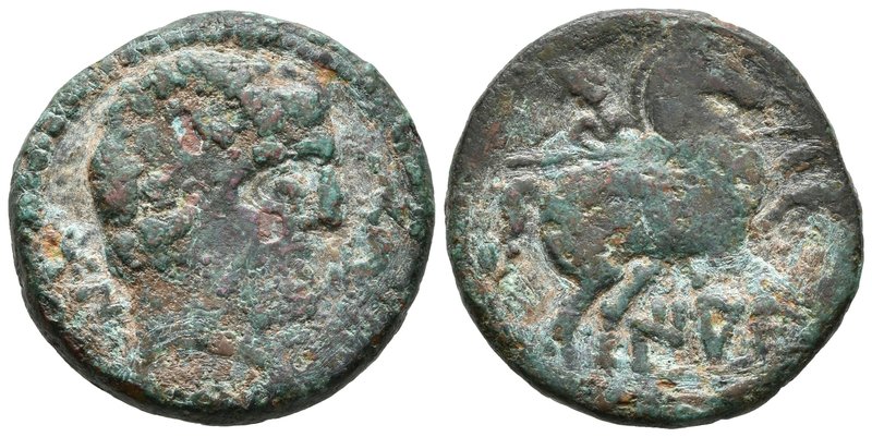 IACA. As. 120-20 a.C. Jaca (Huesca). A/ Cabeza masculina barbada a derecha, dela...