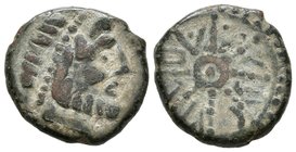 IPTUCI. Semis. 30 a.C. Prado del Rey (Cádiz). A/ Cabeza de Júpiter a derecha. R/ Rueda de ocho rayos, entre ellos leyenda libio-fenicia. FAB-1573. Ae....