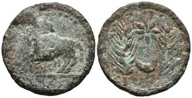 ITUCI. Dupondio. 150-50 a.C. Tejada la Vieja (Sevilla). A/ Jinete con rodela a izquierda, debajo ITVCI. R/ Dos espigas entre ellas creciente y A. FAB-...