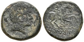OCALACOM. As. 120-20 a.C. Zona de Navarra-Aragón. A/ Cabeza masculina a derecha entre delfines. R/ Jinete con lanza a derecha, debajo leyenda ibérica ...