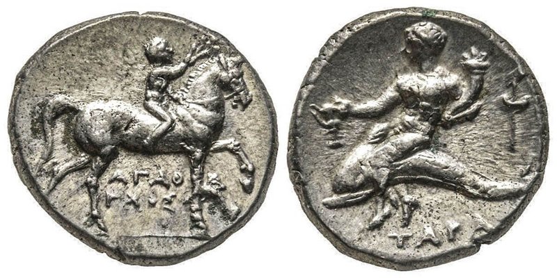 Didrachme ou Nomos, 272-240 avant J.C, AG 6.58 g.
Avers : Guerrier à cheval à dr...