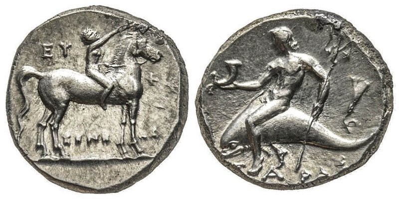 Didrachme ou Nomos, 272-240 avant J.C., AG 6.56 g.
Avers : Jeune à cheval couron...
