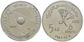 Egypt 
United Arab Republic
5 Pounds World Soccer Championship, AH 1406/1986, AG 17.68 g.
Ref : KM#589
Conservation : NGC PROOF 66 ULTRA CAMEO