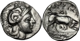 Greek Italy. Southern Lucania, Thurium. AR Diobol, c. 4th century BC. D/ Head of Athena right, wearing helmet decorated with Scylla. R/ ΘOYPIΩN. Bull ...