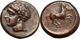 Punic Sicily. Uncertain mint. AE 19 mm. c. 400-350 BC. D/ Wreathed head of female left, wearing earring. R/ Horse prancing right. SNG Cop. 96; MAA 15;...