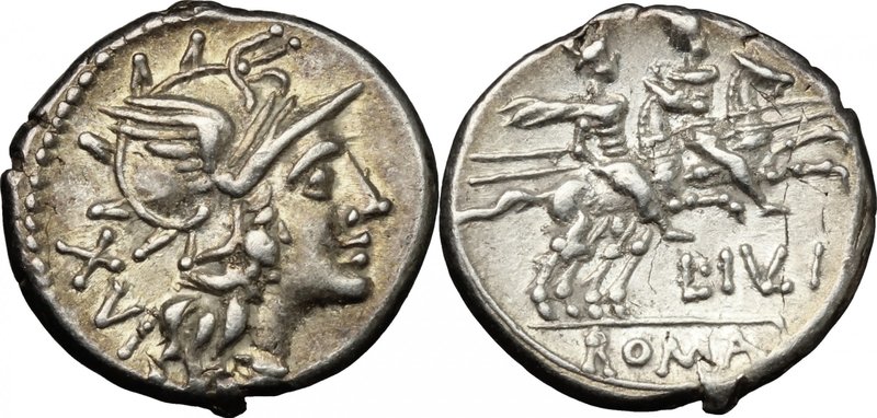 L. Julius. AR Denarius, 141 BC. D/ Helmeted head of Roma right; behind, XVI. R/ ...