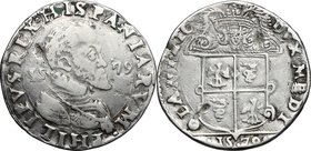 Milano. Filippo II (1554-1598). Scudo d'argento 1579. D/ Busto corazzato a destra, testa nuda; ai lati 15-79. R/ Stemma inquartato con l'aquila e la b...