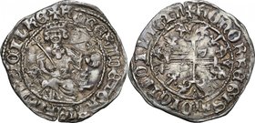 Napoli. I Crociati (XIV sec.). Imitazione del gigliato al nome di Roberto d'Angiò. D/ Il Re coronato, seduto di fronte tra due protome di leoni, tiene...