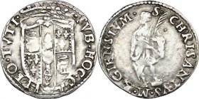 Reggio Emilia. Ercole II d'Este (1534-1559). Giulio. D/ Scudo Estense coronato e inquartato. R/ San Crisanto in piedi di fronte con piede appoggiato s...