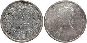British India
Rupee 1/2
Rupee 1/2
Silver Half Rupee Coin of Victoria Empress of Calcutta Mint of 1877.
1877, Victoria Empress, Silver 1/2 Rupee, C...