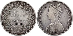 British India
Rupee 1/2
Rupee 1/2
Silver Half Rupee Coin of Victoria Empress of Bombay Mint of 1898.
1898 (8 over 7), Victoria Empress, Silver 1/2...