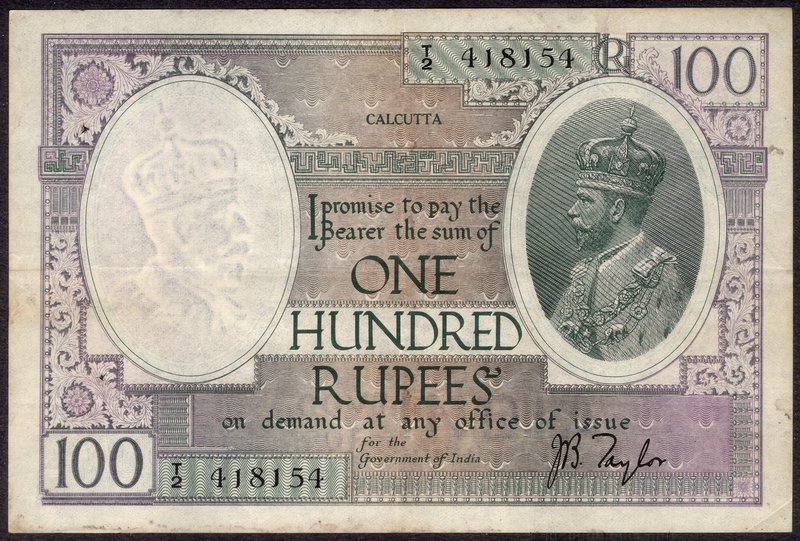 British INDIA Notes
K. G. V.
One Hundred Rupees Note of King George V Signed b...