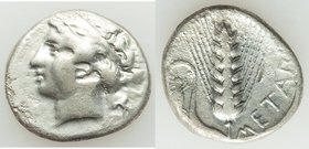 LUCANIA. Metapontum. Ca. 400-340 BC. AR stater or didrachm (22mm, 7.41 gm, 4h). VF, porosity, countermark. Ca. 380-340 BC. Head of female left, wearin...