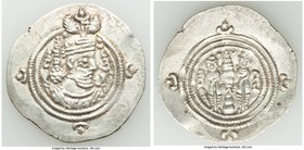 SASANIAN KINGDOM. Khusro II (AD 590-628). AR drachm (33mm, 4.04 gm, 3h). Choice VF. Bust of Khusro II right, wearing mural crown with frontal crescent...