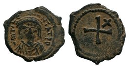 Tiberius II Constantine. 578-582. AE decanummium 

Condition: Very Fine

Weight: 2.54 gr
Diameter: 18 mm