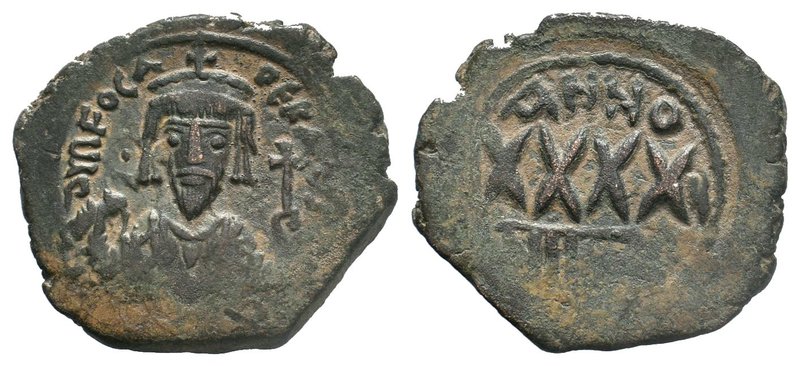 Phocas, 602-610 AD. AE Follis 

Condition: Very Fine

Weight: 11.05 gr
Diameter:...