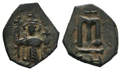 ARAB-BYZANTINE: Standing imperial Figure, Time of the Rashidun. circa AH 19-39 / AD 641-660s

Condition: Very Fine

Weight: 3.42 gr
Diameter: 22 mm