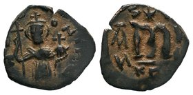 ARAB-BYZANTINE: Standing imperial Figure, Time of the Rashidun. circa AH 19-39 / AD 641-660s

Condition: Very Fine

Weight: 2.45
Diameter: 20 mm