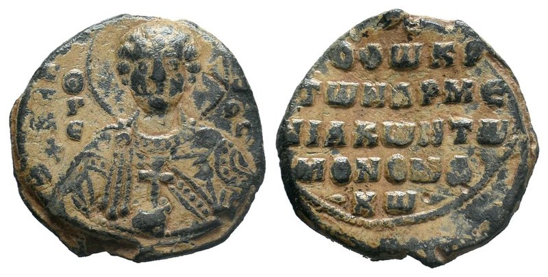An excellent lead seal of Theodoros Monomachos, krites of the Armeniakoi (11th c...