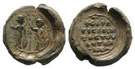 Byzantine lead seal of Leon the Photelios (ca 11th/12th cent.)
Obverse: The military saints Theodore and George(?), nimbate, standing facing, holding ...