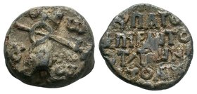 Byzantine lead seal of Ioannes 
hypatos and protonotarios of Anatolikon (8th cent.)

Obverse: Invocative cruciform monogram, inscribed in the 4 corner...