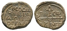 Byzantine lead seal of Theodoros imperial kandidatos 
and droungarios (8th cent.)

Obverse: Invocative cruciform monogram, inscribed in the 4 corners:...