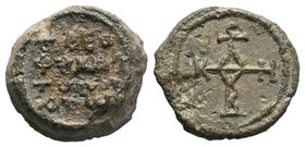 Byzantine lead seal of N. chartoularios
(7th/8th cent.)

Obverse: Invocative cruciform monogram: ΘΕΟΤΟΚΕ ΒΟΗΘΕΙ = Θεοτόκε, βοήθει (Mother of God, help...