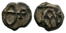 Byzantine lead seal of Theodoros patrikios
(6th/7th cent.)

Obverse: Letters Θ and P with most possibly E, reading as: ΘΕ(ΟΔΩ)Ρ(ΟΥ) = Θεοδώρου (Of The...