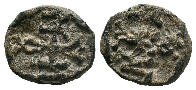 Byzantine lead seal of Naoum chartoularios 
(6th/7th cent.)

Obverse: Cruciform ...