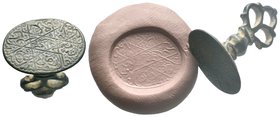 Islamic Stamp Seal. 13th - 17th C. AD.

Condition: Very Fine

Weight: 8.88 gr
Diameter: 27.73 mm
