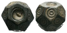Byzantine bronze barrel weight with ring and dot motifs

Condition: Very Fine

Weight: 14.57 gr
Diameter: 12.90 mm