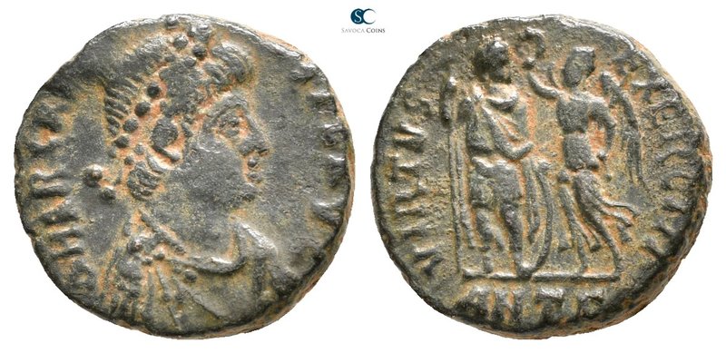 Arcadius AD 383-408. Antioch
Follis Æ

15 mm., 2,63 g.



very fine
