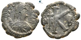 Justinian I AD 527-565. Nikomedia. Half follis Æ