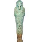 EGIPTO. Ushebti. Dinastía XXVI (664-525 a.C.). Fayenza. Altura 12,7 cm. Incluye peana.