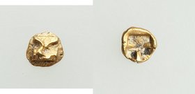 IONIA. Uncertain mint. Ca. 600-550 BC. EL 1/96 stater (5mm, 0.16 gm). NGC (photo-certificate) AU 5/5 - 4/5. Tetraskelion pattern on raised square / Ro...