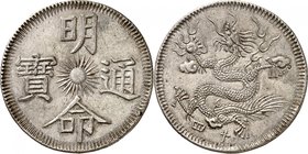 Minh Mang, 1820-1841. 
Piastre de 7 tien An 14 (1833). Quatre idéogrammes disposés autour d’un soleil rayonnant / Dragon dans les nuages. Année du rè...