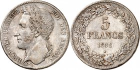 Royaume de Belgique
Léopold I, 1831-1865. 
5 Francs 1838, Bruxelles. Tranche position B. Tête coiffée d'une couronne de chêne à gauche / valeur et d...