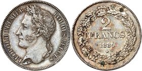 Royaume de Belgique
Léopold I, 1831-1865. 
2 Francs 1834, Bruxelles. Tranche position B. Tête coiffée d'une couronne de chêne à gauche / valeur et d...