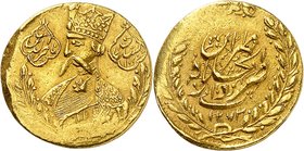 Nasir al-Din Shah, 1848-1896. 
Toman AH 1273 (1856-57), Téhéran. Buste à gauche entre deux branches de laurier / Inscription et date dans une couronn...