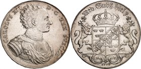 Carl XII, 1697-1718. 
Riksdaler 1718, Stockholm. Buste à droite / Armoiries couronnées entre deux lions debout. Date en-dessous. Dav. 1716 Star in sh...