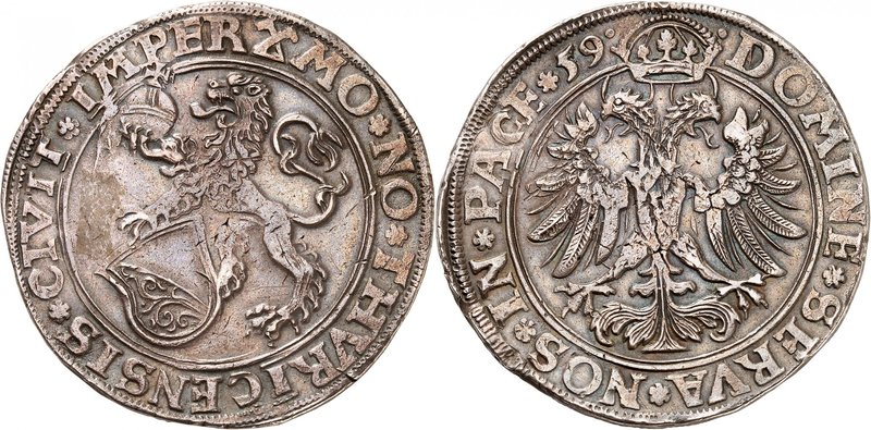 Zurich
Taler 1559, Zurich. Lion debout à gauche, tenant un globe impérial et un...