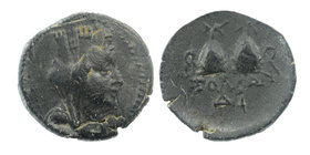 Cilicia, Soloi Æ20. Circa 100-30 BC. 
Turreted, veiled, and draped bust of Tyche right 
Piloi of the Dioskouroi; monogram below. 
SNG France 1206....