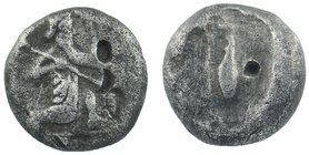 Kings of Persia (Achaemenids). AR Siglos . c. 450-400 BC. 
The Great King, bearded, in "Knielauf" to right, holding bow and dagger and Interesting co...