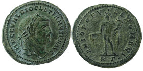 Diocletian. AD 284-305. AE . Cyzicus mint, 
Struck AD 295-296. 
Laureate head right / Genius standing left, holding patera and cornucopia; KΓ. 
RIC...