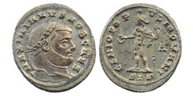 GALERIUS MAXIMIANUS (305-311). Silvered Follis. Siscia. AE
Obv: MAXIMIANVS NOB CAES.
Laureate head right.
Rev: GENIO POPVLI ROMANI,.Genius standing...