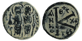 Justin II. 565-578. AE half follis 
Thessalonica mint
Justin II and Sophia seated on throne facing, both nimbate; he holds a globus cruciger while s...