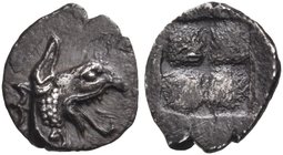 IONIA. Teos. Circa 460-420 BC. Tetartemorion (Silver, 6 mm, 0.28 g). Head of griffin to right, with open jaws. Rev. Quadripartite incuse square. Balce...