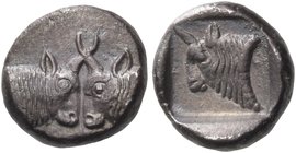 CARIA. Uncertain ('Mint D'). Circa 450-400 BC. Diobol (Silver, 9 mm, 1.05 g, 5 h). Confronted foreparts of two bulls, their horns crossed. Rev. Head o...