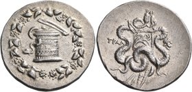 LYDIA. Tralleis. Circa 166-67 BC. Cistophoric Tetradrachm (Silver, 28 mm, 12.71 g, 12 h), 166-160. Basket (cista mystica) from which snake coils; arou...